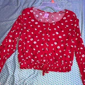 Red long sleeve with white and black flowers